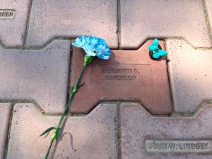 Memorial brick with blue flower and blue butterfly magnet